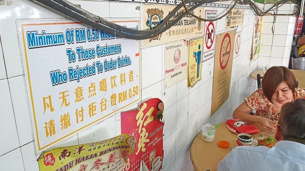 A 50sen charge sign being displayed at a coffee shop in Penang