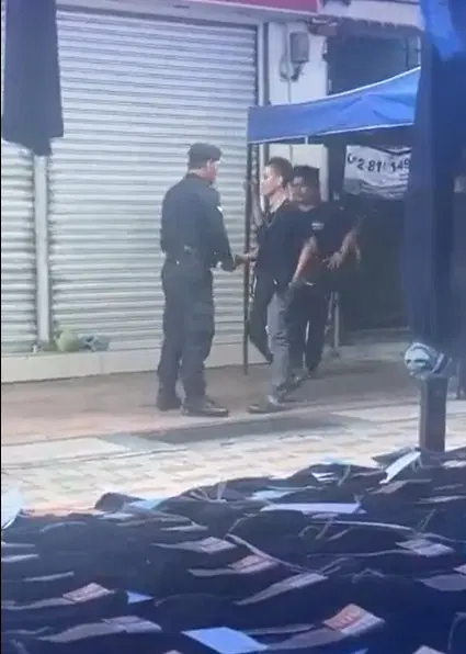 Sabah police officer allegedly accepts bribe in broad daylight, probe ongoing | weirdkaya