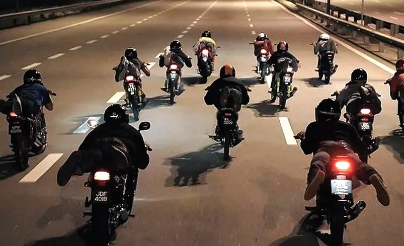 Mat rempits racing on the road