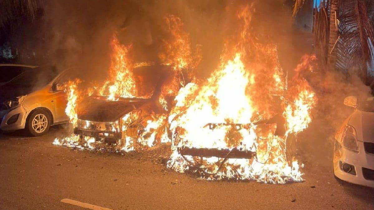 Cars burning in Cheras