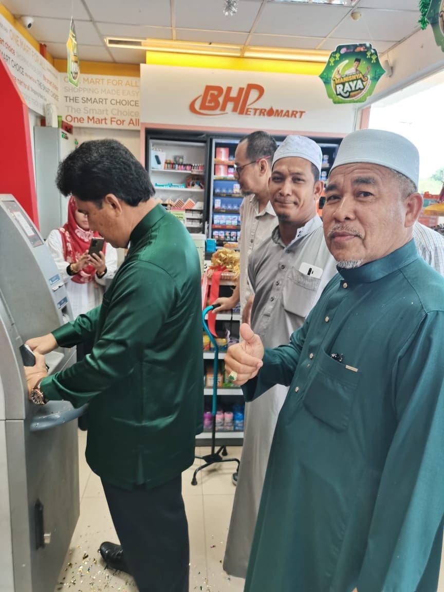PAS MP Holds Ribbon-Cutting Ceremony For New ATM, Netizens Left Bewildered