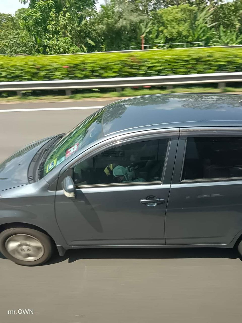 M'sian woman seen resting head on myvi driver's lap, sparks debate among netizens