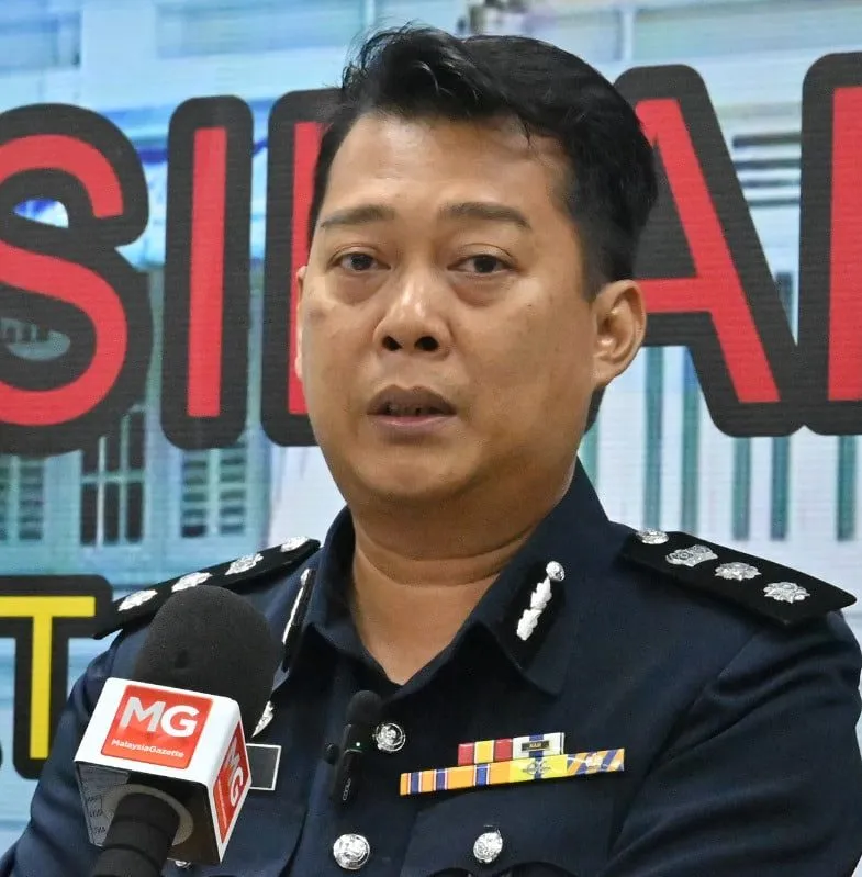 Melaka tengah district police chief acp christopher patit
