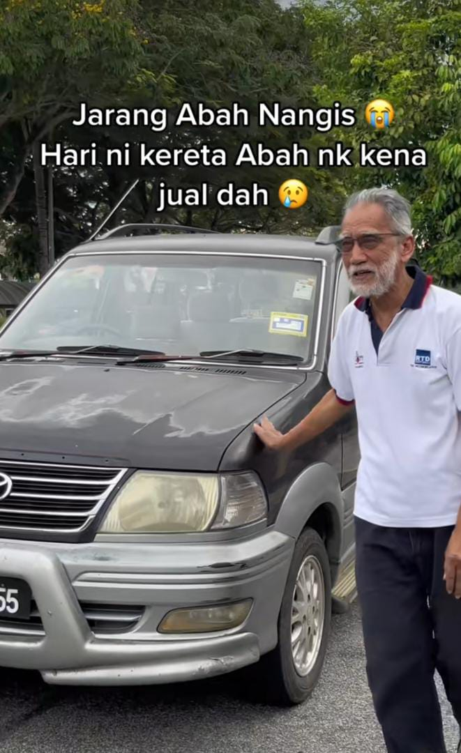 Dad holds his toyota unser one last time before selling it off