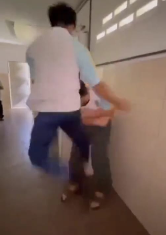 Boy flies and kick another student in the bathroom