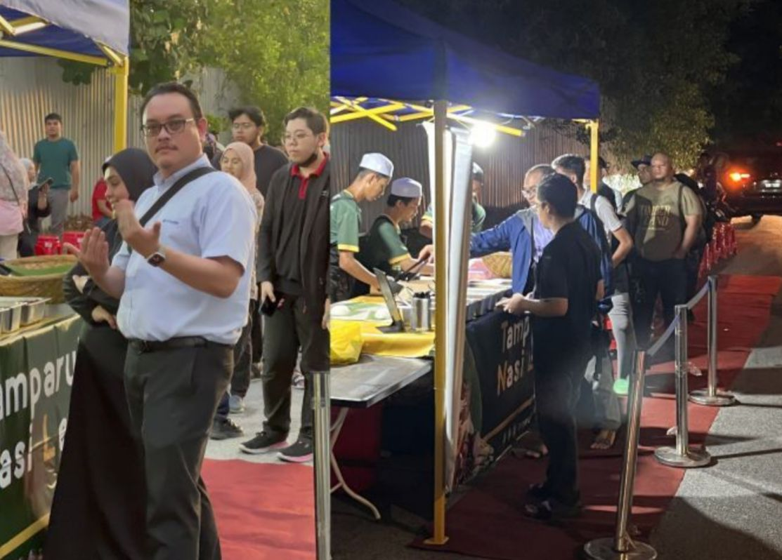Nasi lemak stall in shah alam causes a stir by welcoming customers with red carpet