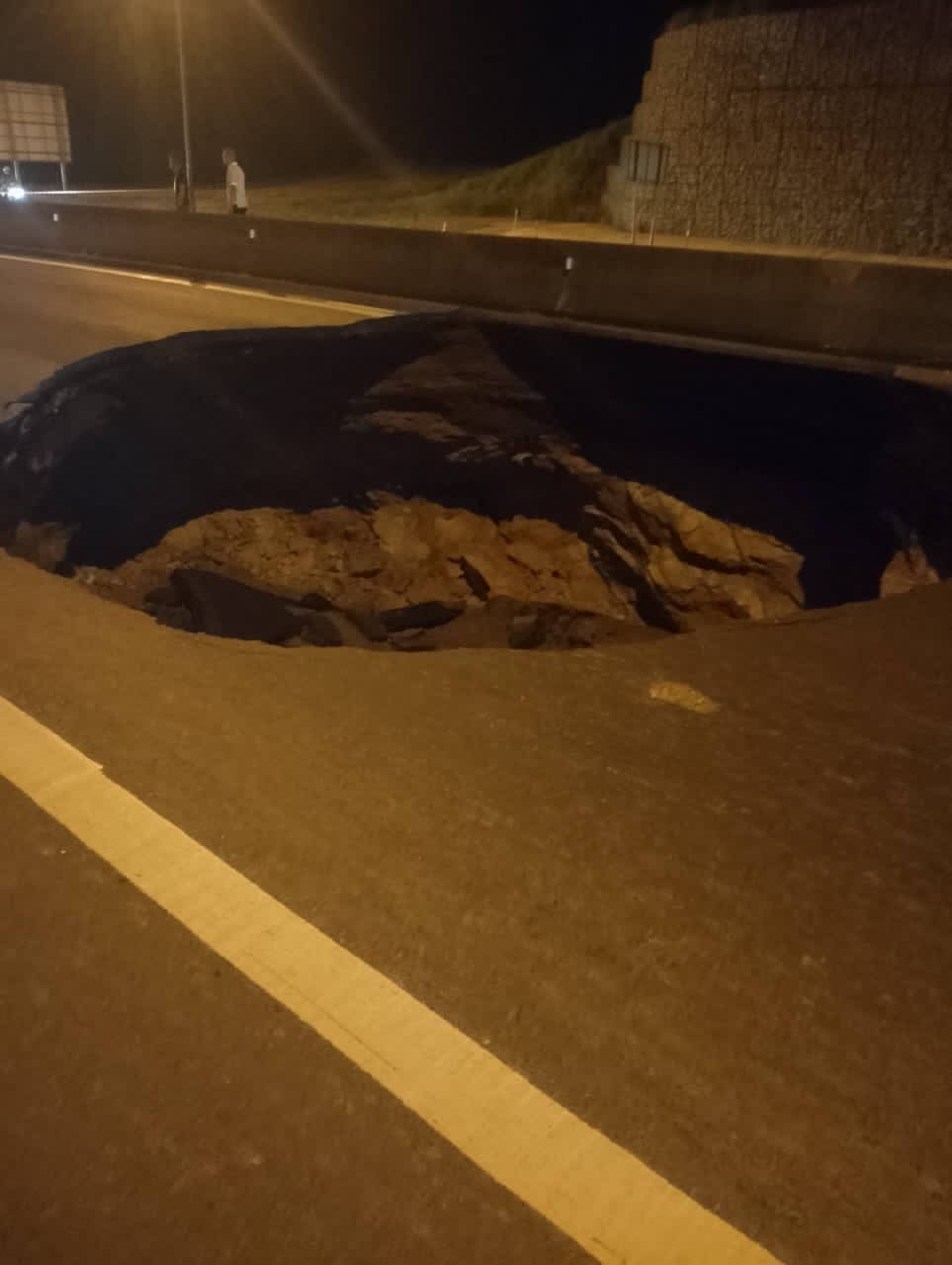Giant Sinkhole Spotted At KL-Karak Highway Due To Underground Tunnel Works