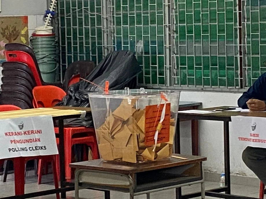 Penang woman accidentally drops ic into ballot box while voting
