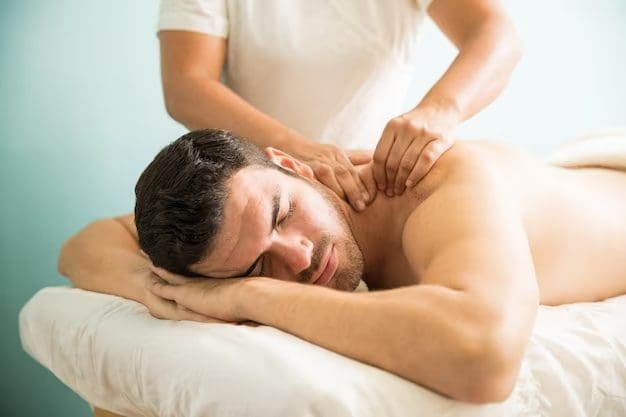 Man giving another man a massage