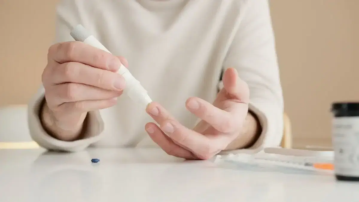 Person checking her blood sugar levels