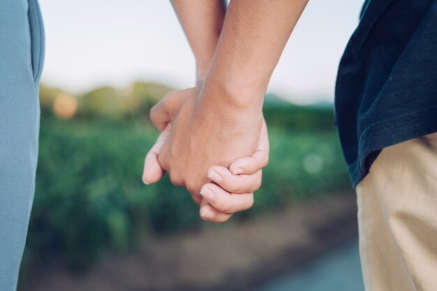 Couple holding hands