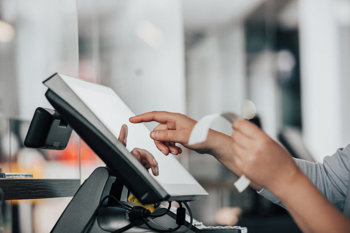 Female cashier at the counter