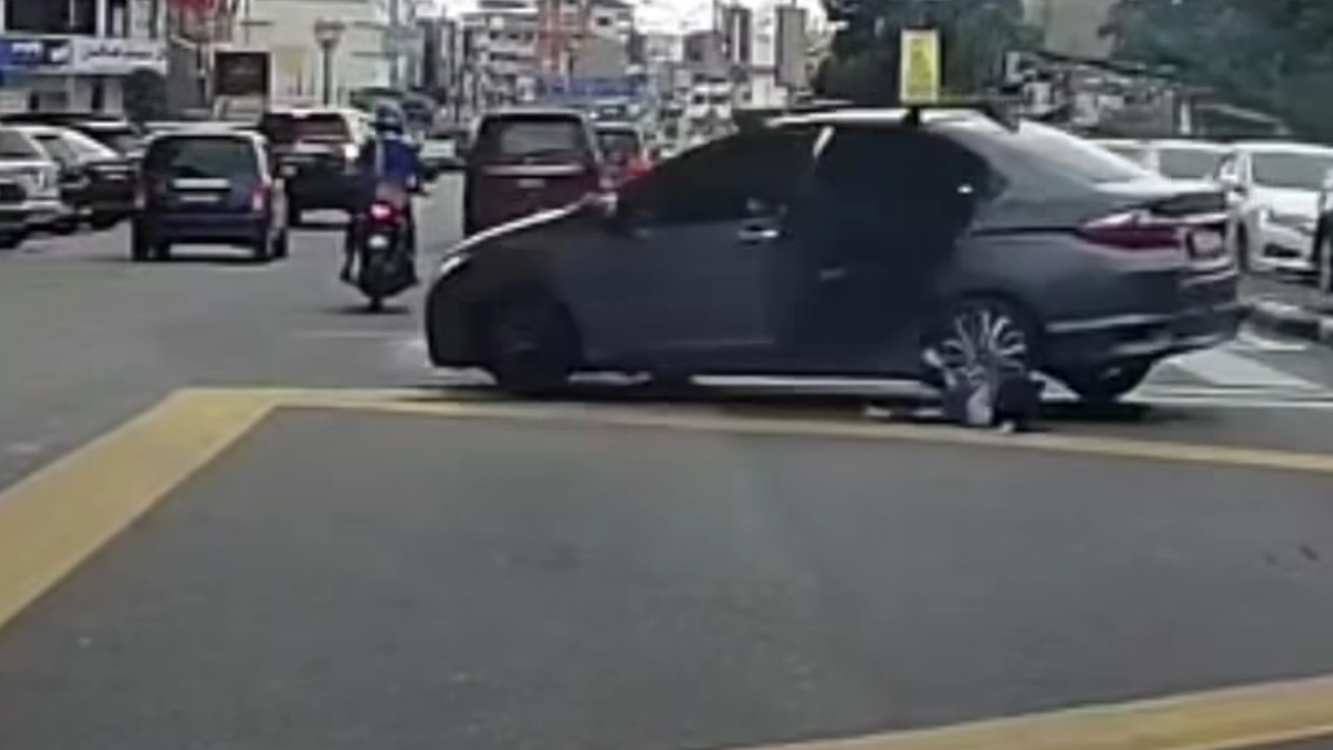 Child falls from car during u-turn, struck by oncoming suv after door opens unexpectedly | weirdkaya