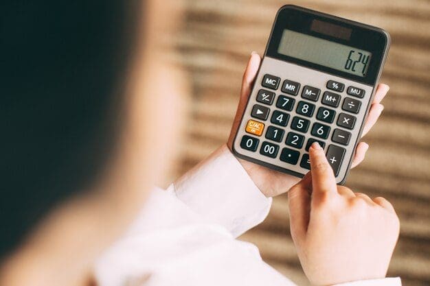 Woman using a calculator