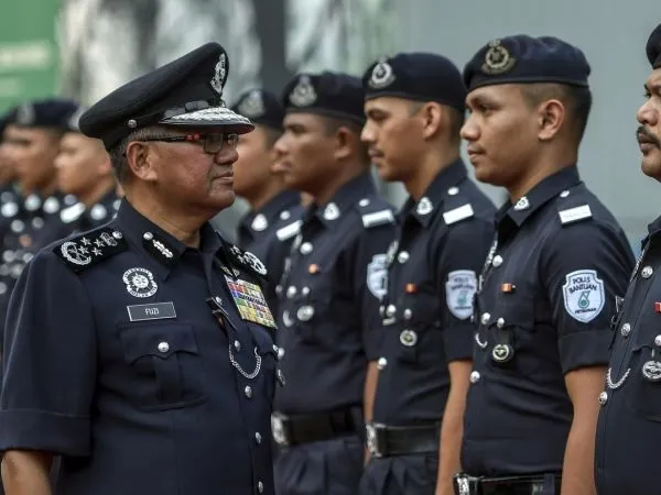 Malaysian police officers