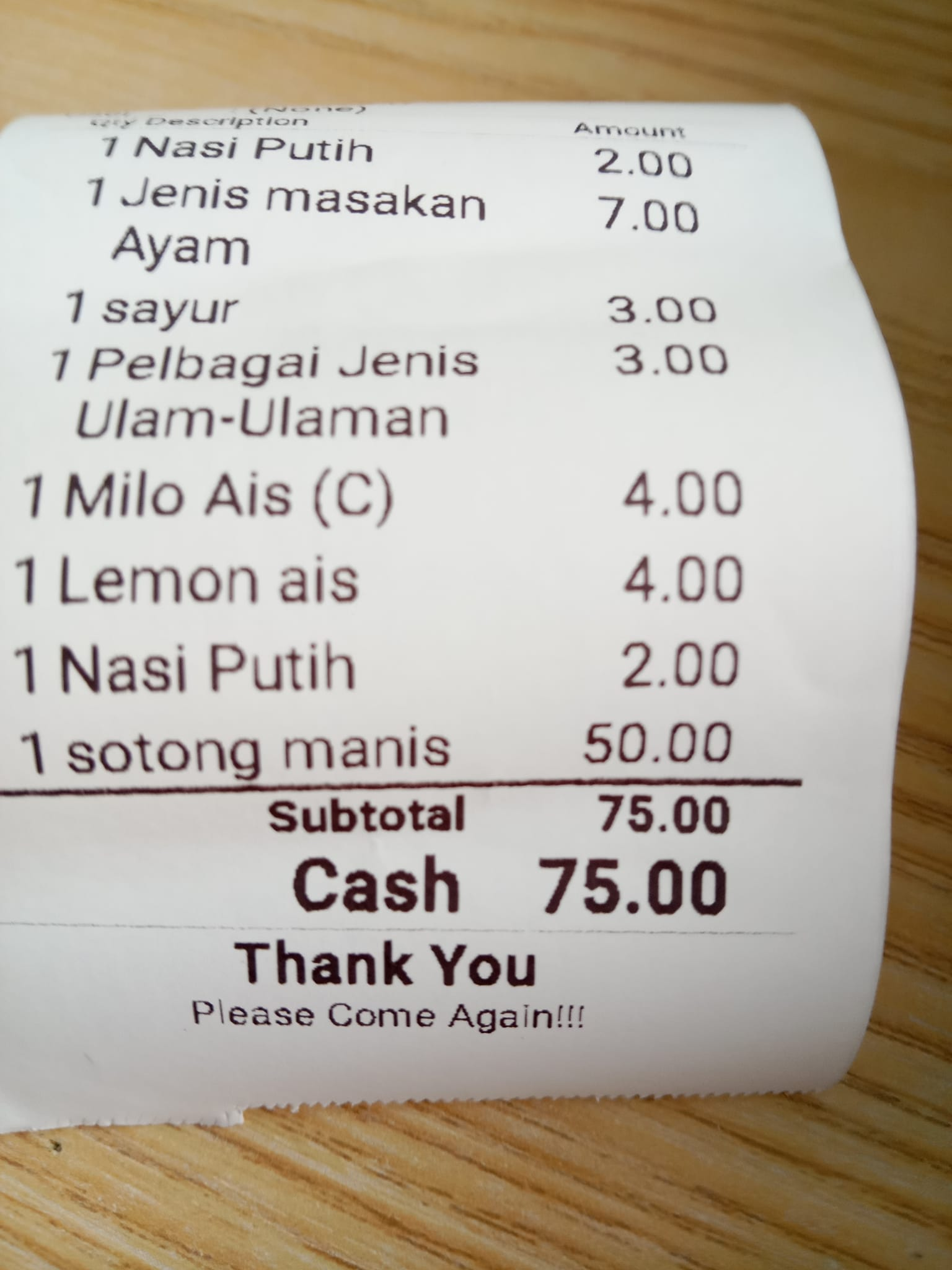 Receipt showing rm50 for each piece of squid