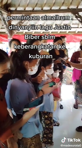 [video] funeral attendees sing justin bieber's 