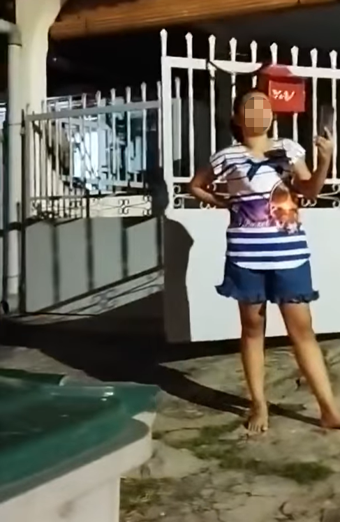 [video] inconsiderate woman places rubbish bin in the middle of road to block incoming cars | weirdkaya