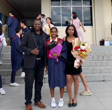 Jazmin with her parents