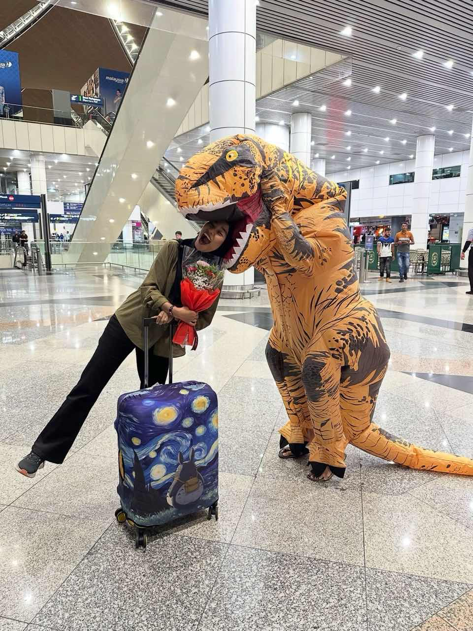 Amira with her husband as T-Rex