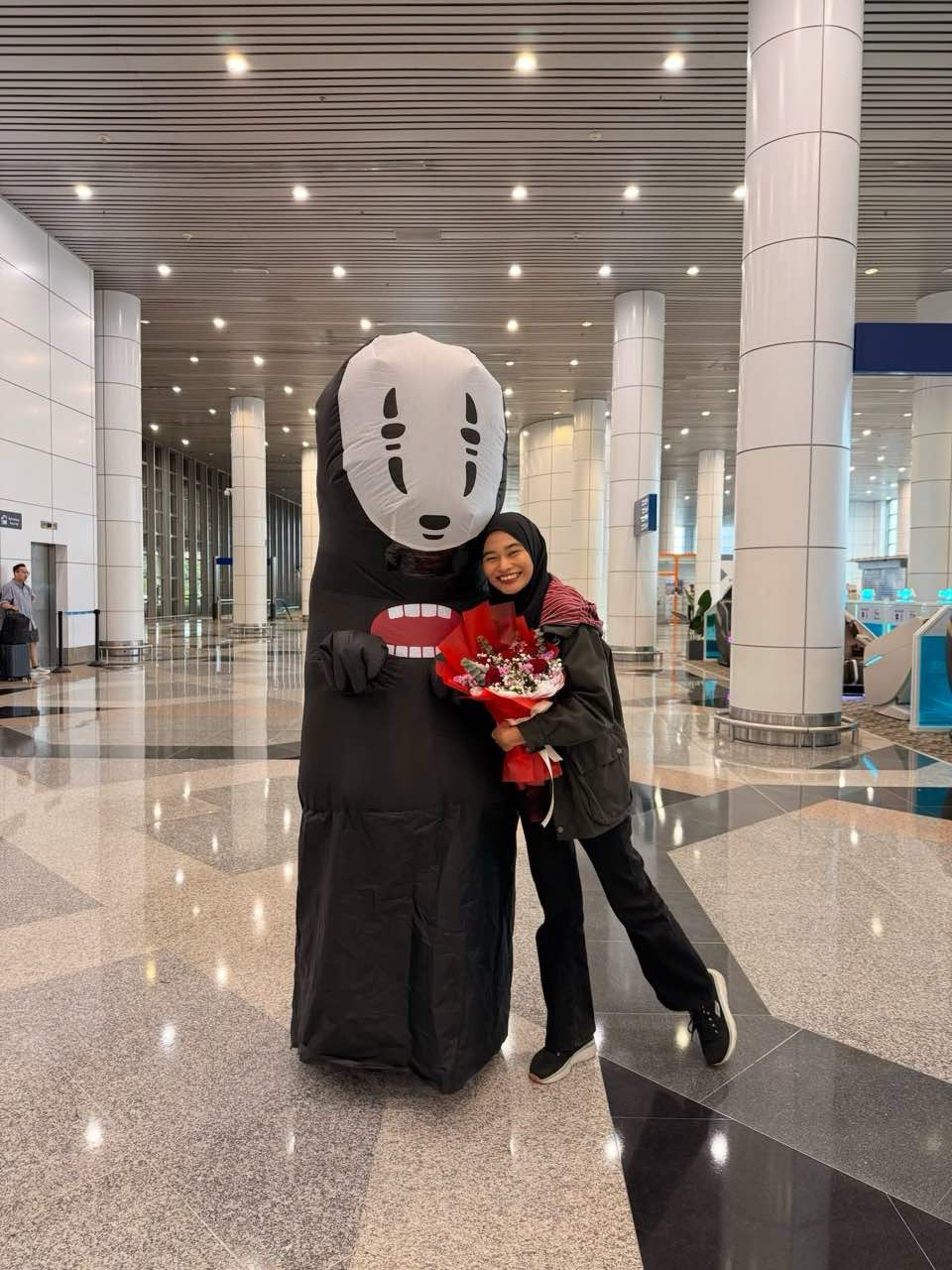 Amira with her husband as a character from Spirited Away