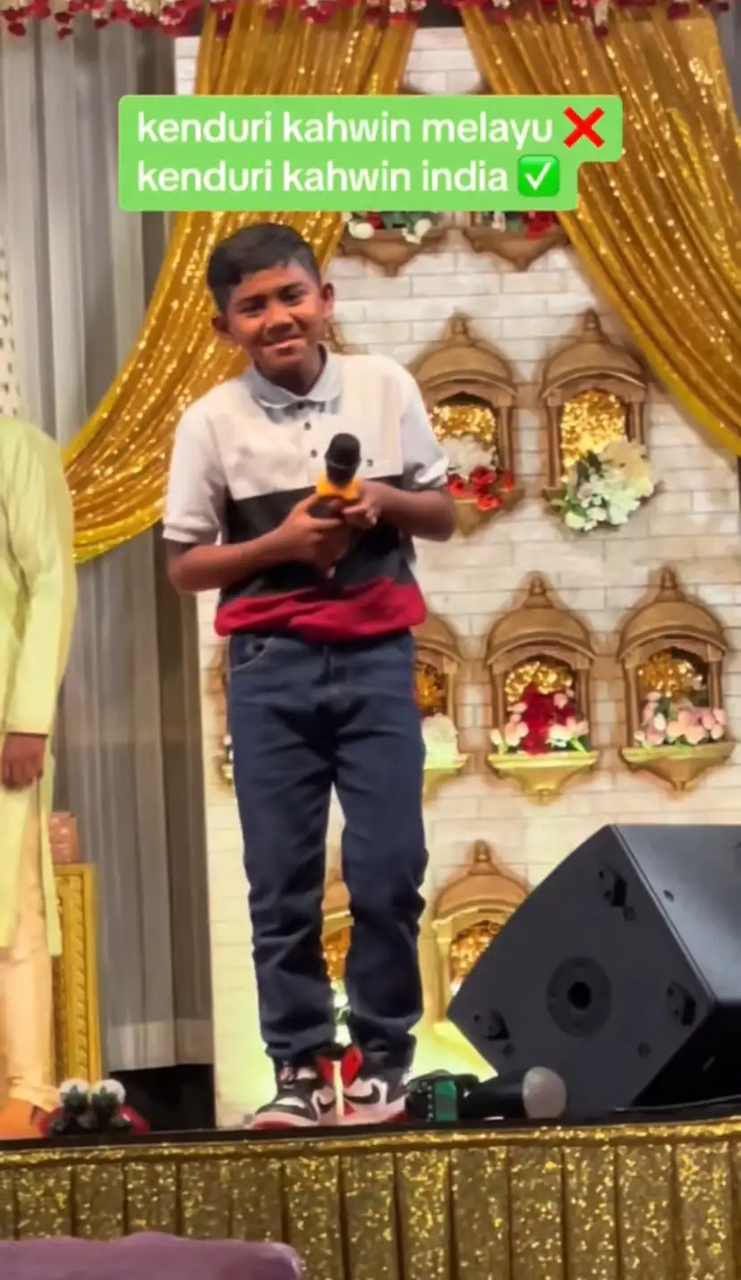 Malaysian indian boy singing classic malay song at indian wedding