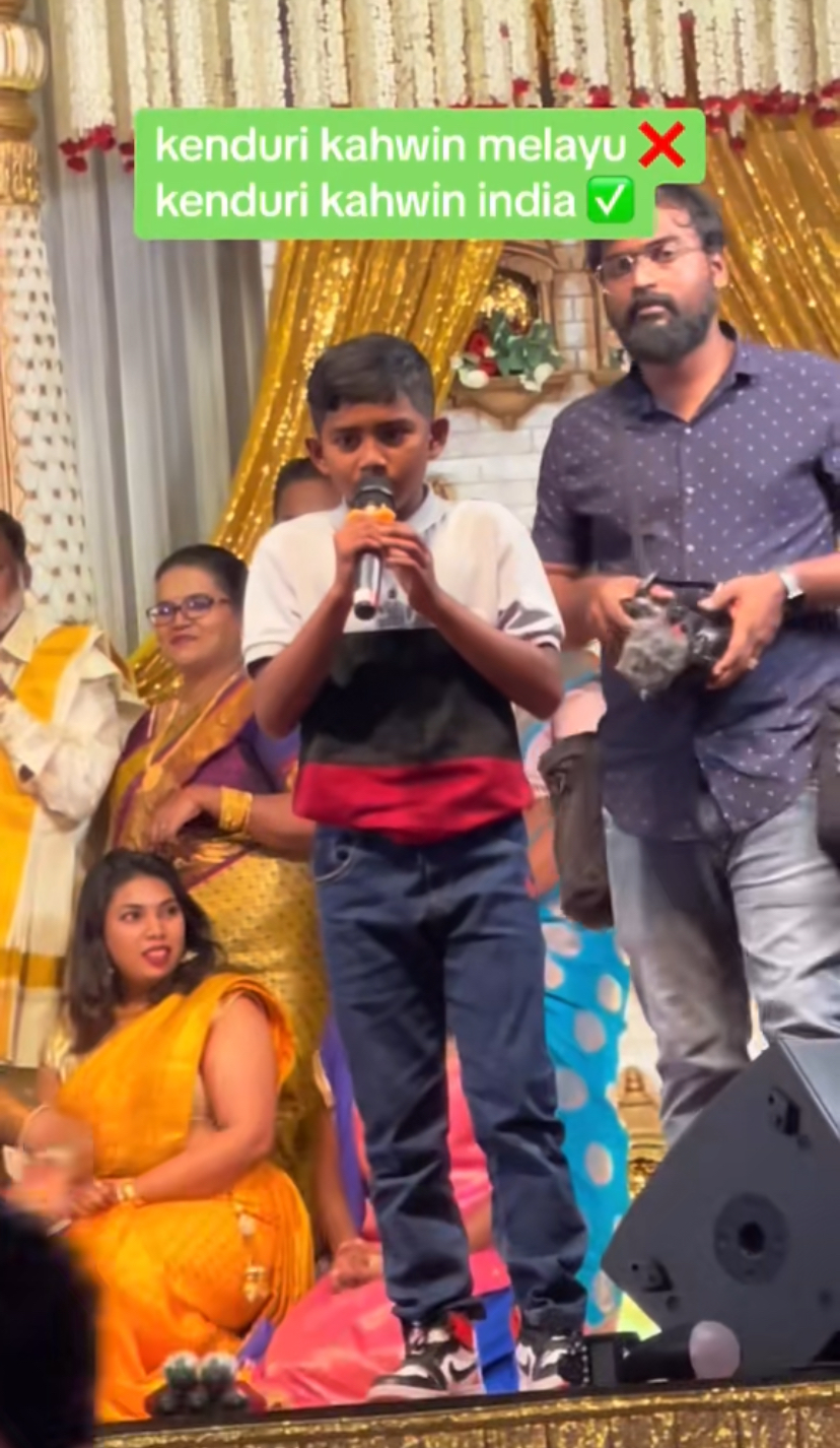 Malaysian indian boy singing classic malay song at indian wedding