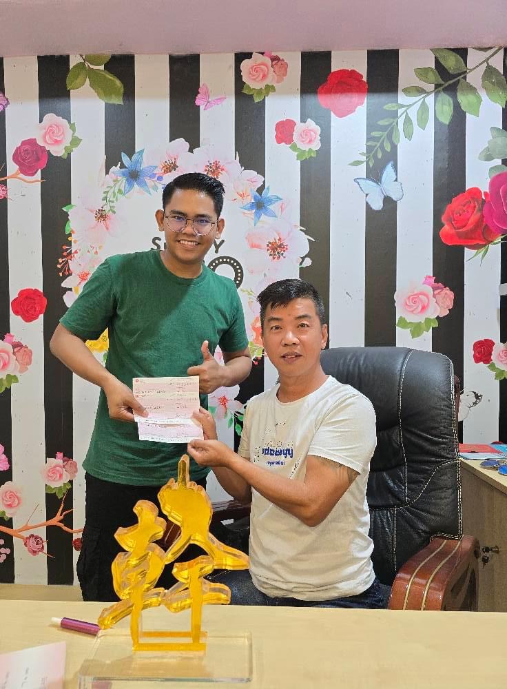 Sunny seow with his malay employee