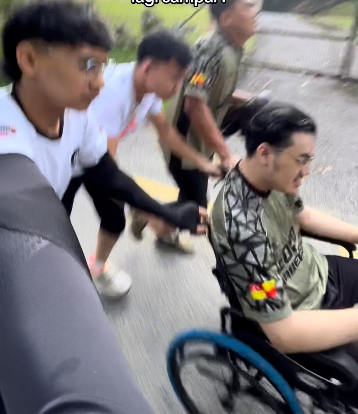 M'sians go the extra mile to let their friend with disability feel the joy of jogging | weirdkaya