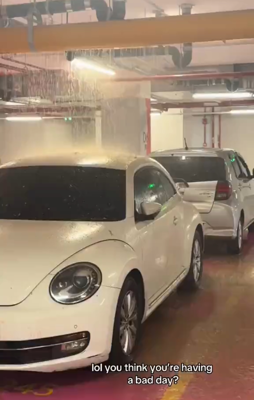 Volkswagen beetle drenched with sewage water at trx parking