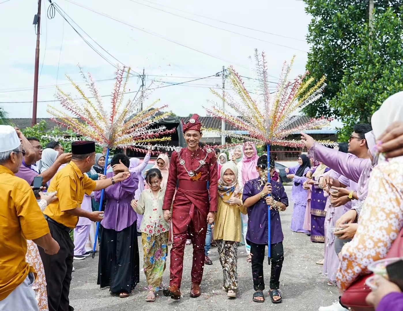 Malay man in traditional wedding attire alone heading to his wedding ceremony
