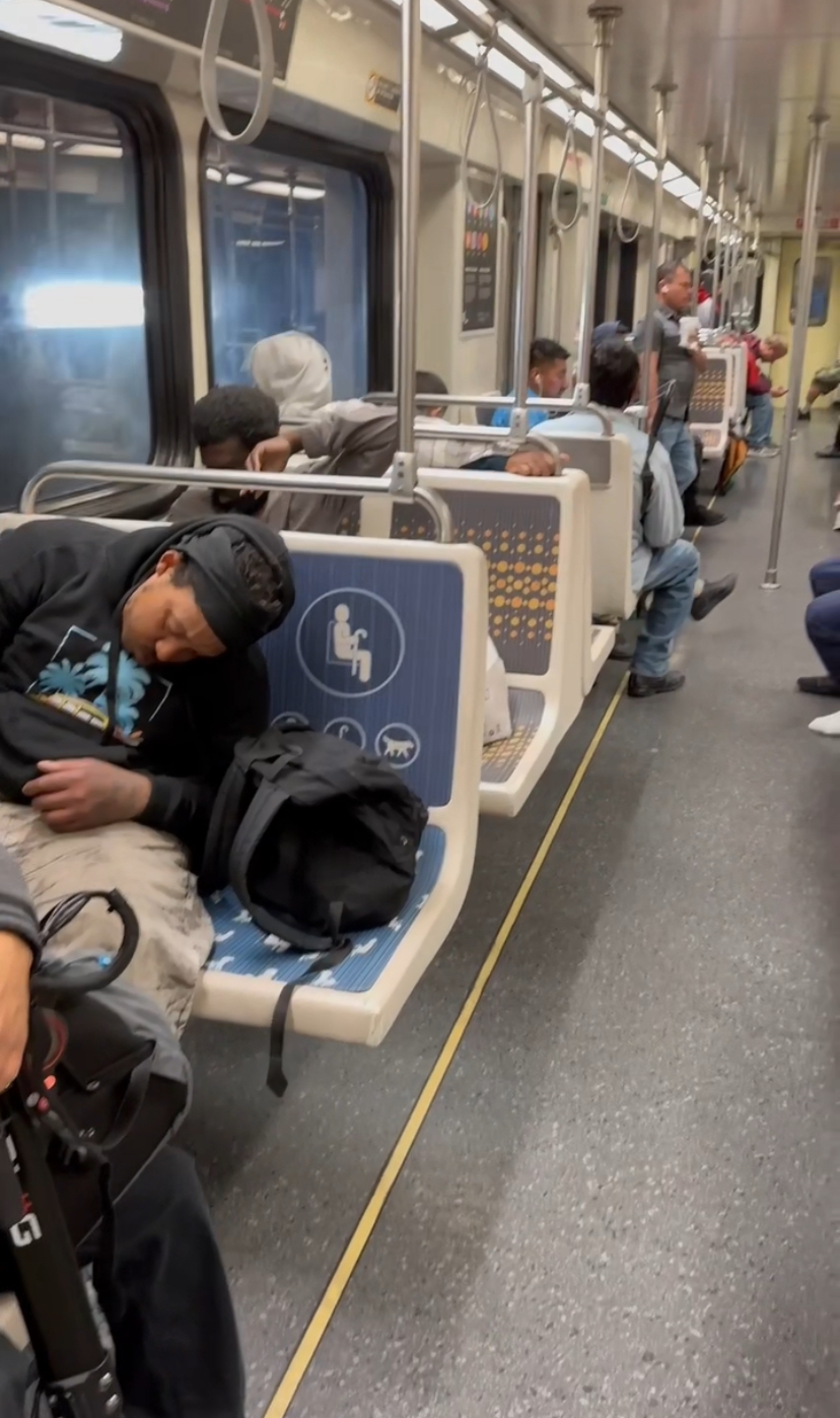 Homeless people sleeping on the la metro