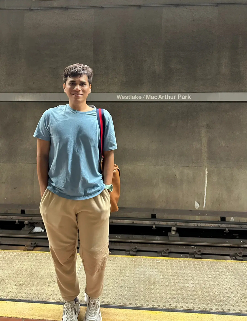 Malaysian man standing at la metro station