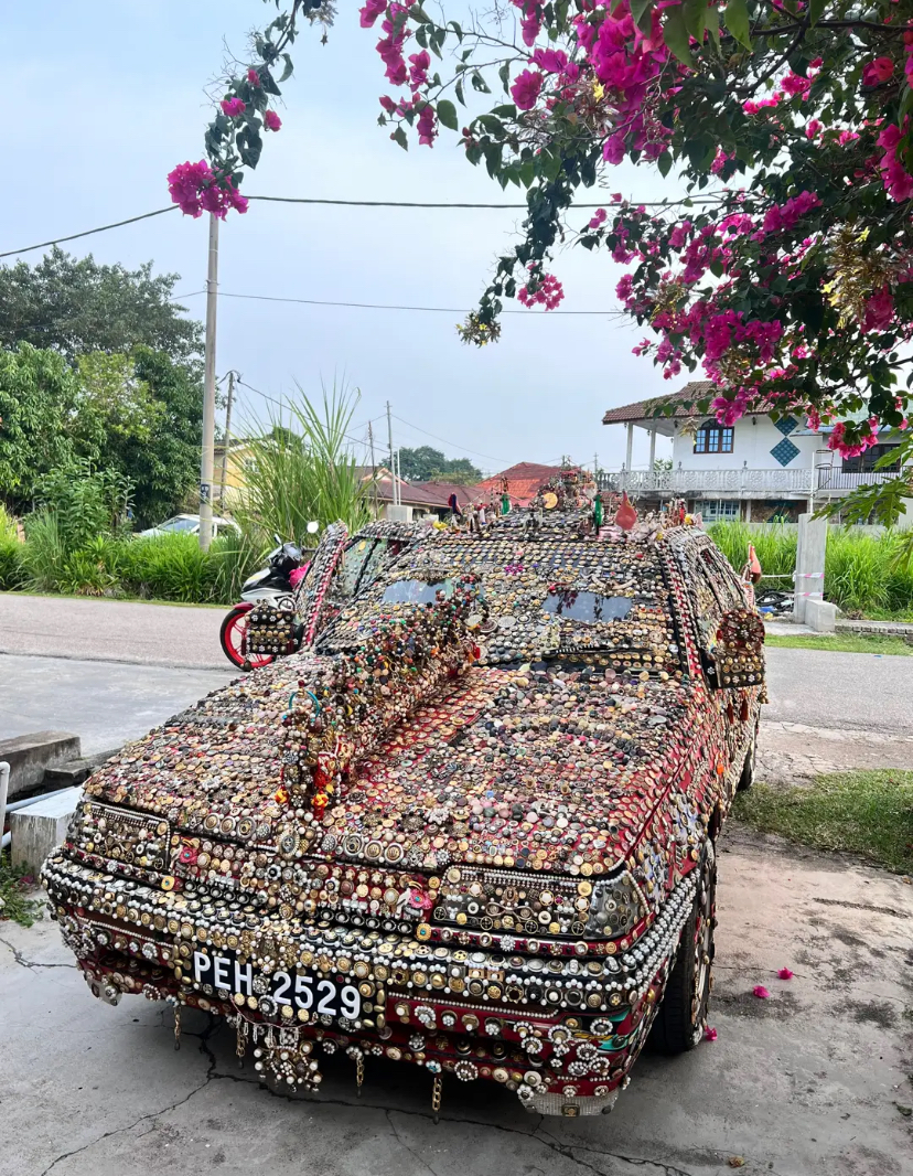 M'sian man decorates proton saga with jewellery and figurines