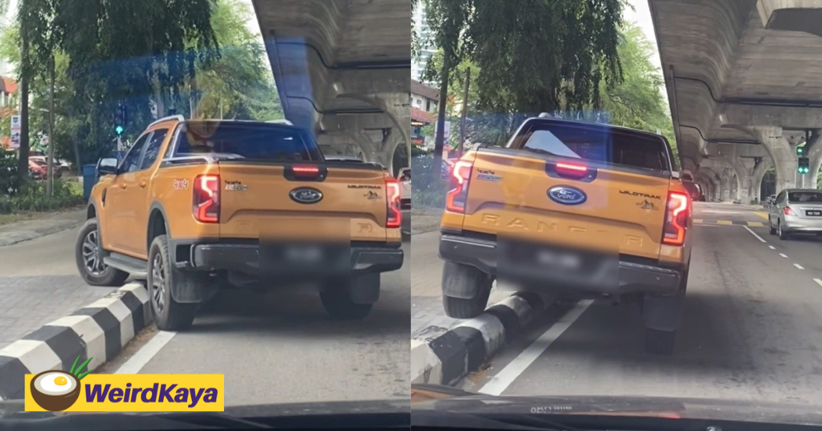 Impatient 4x4 vehicle tries to drive over divider near subang, fails & returns to its own lane | weirdkaya