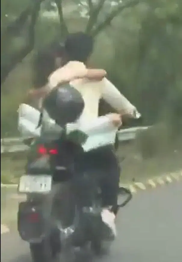 Indian couple fined for hugging on bike