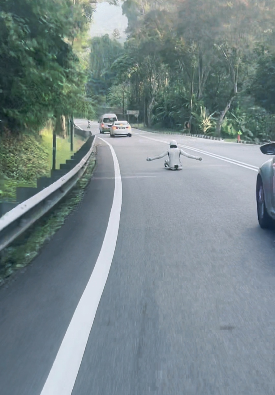 Individual riding street luge