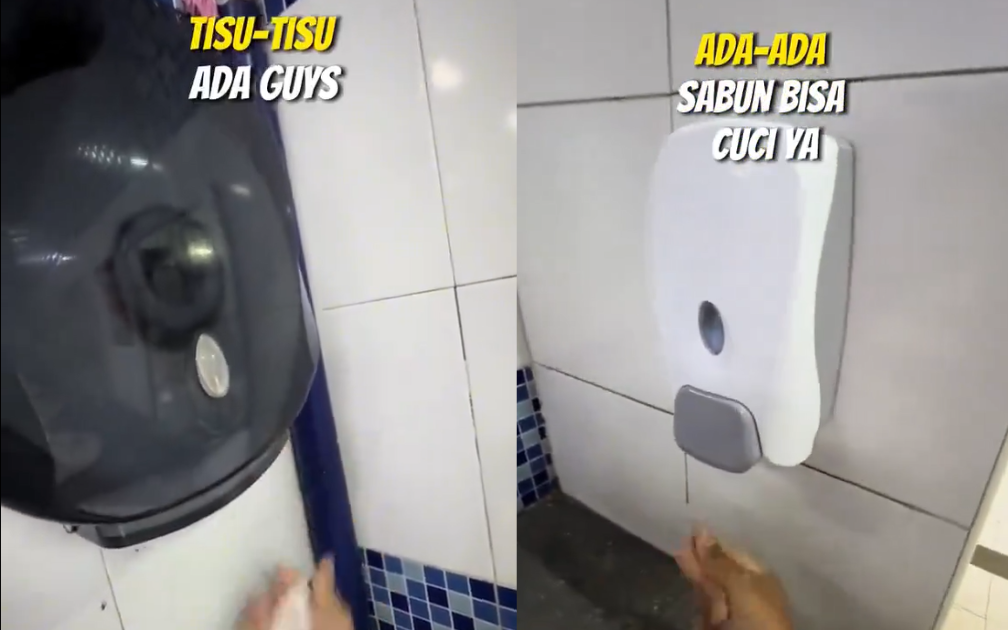Indonesian man shows soap and tissue paper at public toilet