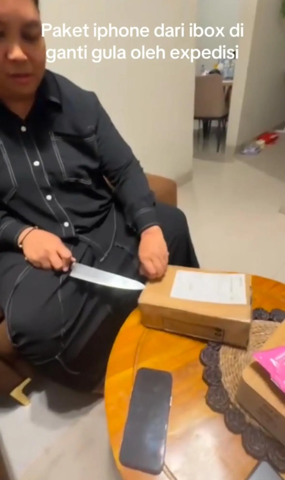 Indonesian Woman Stunned To Discover iPhone 16 Plus She Ordered Was Swapped With 1KG Of Sugar