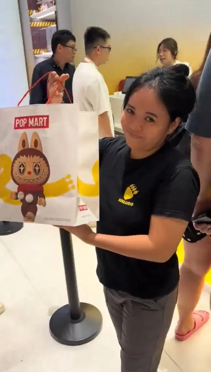 influencer buys labubu for helper 1