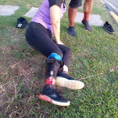 Injured individual on the grass