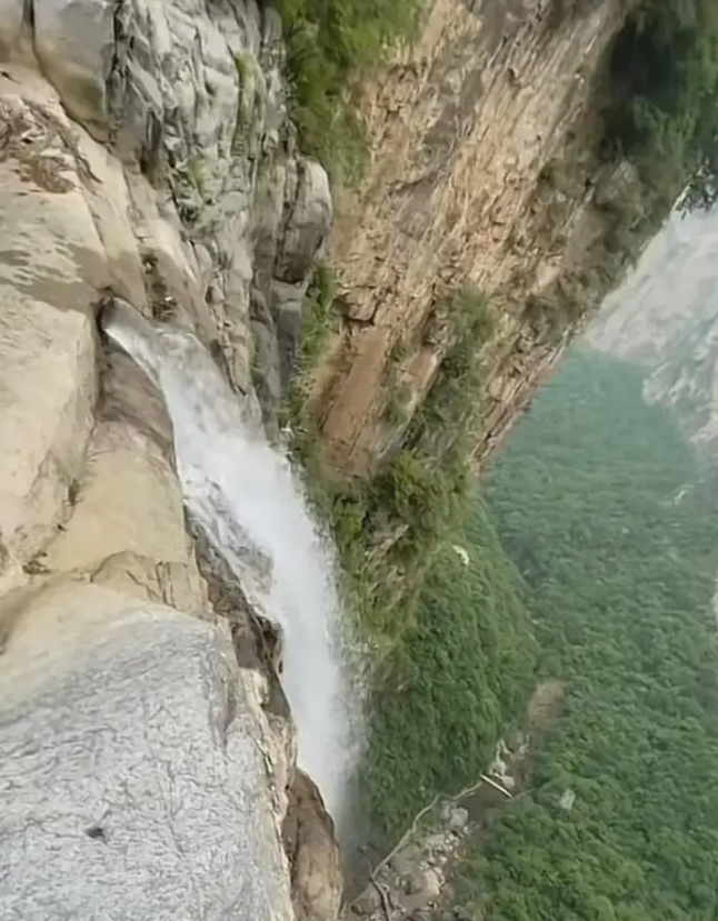 Is asia’s tallest ‘waterfall’ actually just water flowing out from pipe? | weirdkaya