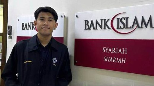 msian man at his workplace