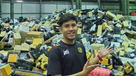 msian man at his workplace
