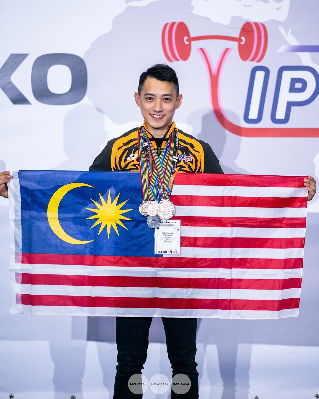 Kenneth after being crowned the commonwealth powerlifting champion in the u59kg open category