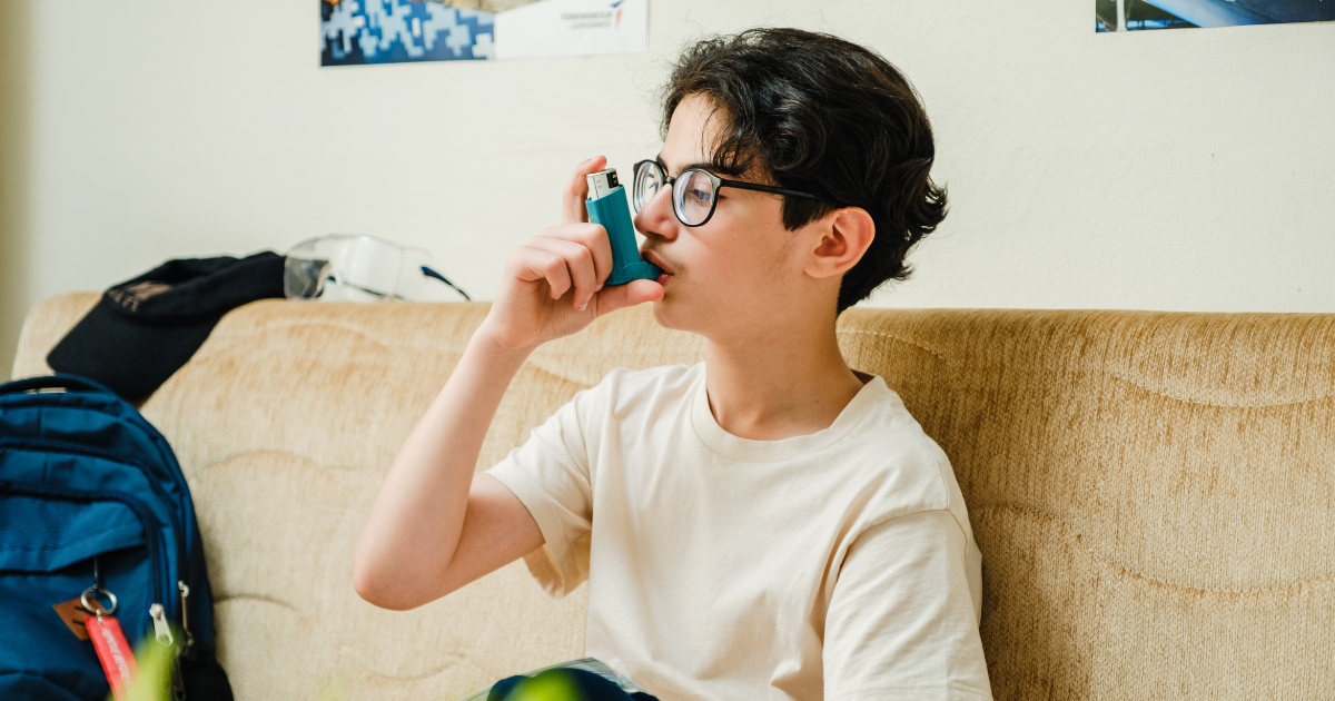 kid using inhaler