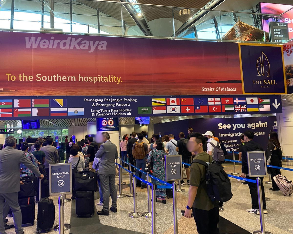 KLIA airport lobby departures Malaysian lane to customs immigration