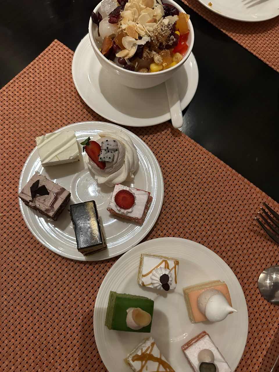 Desserts in a plate along with ais kacang