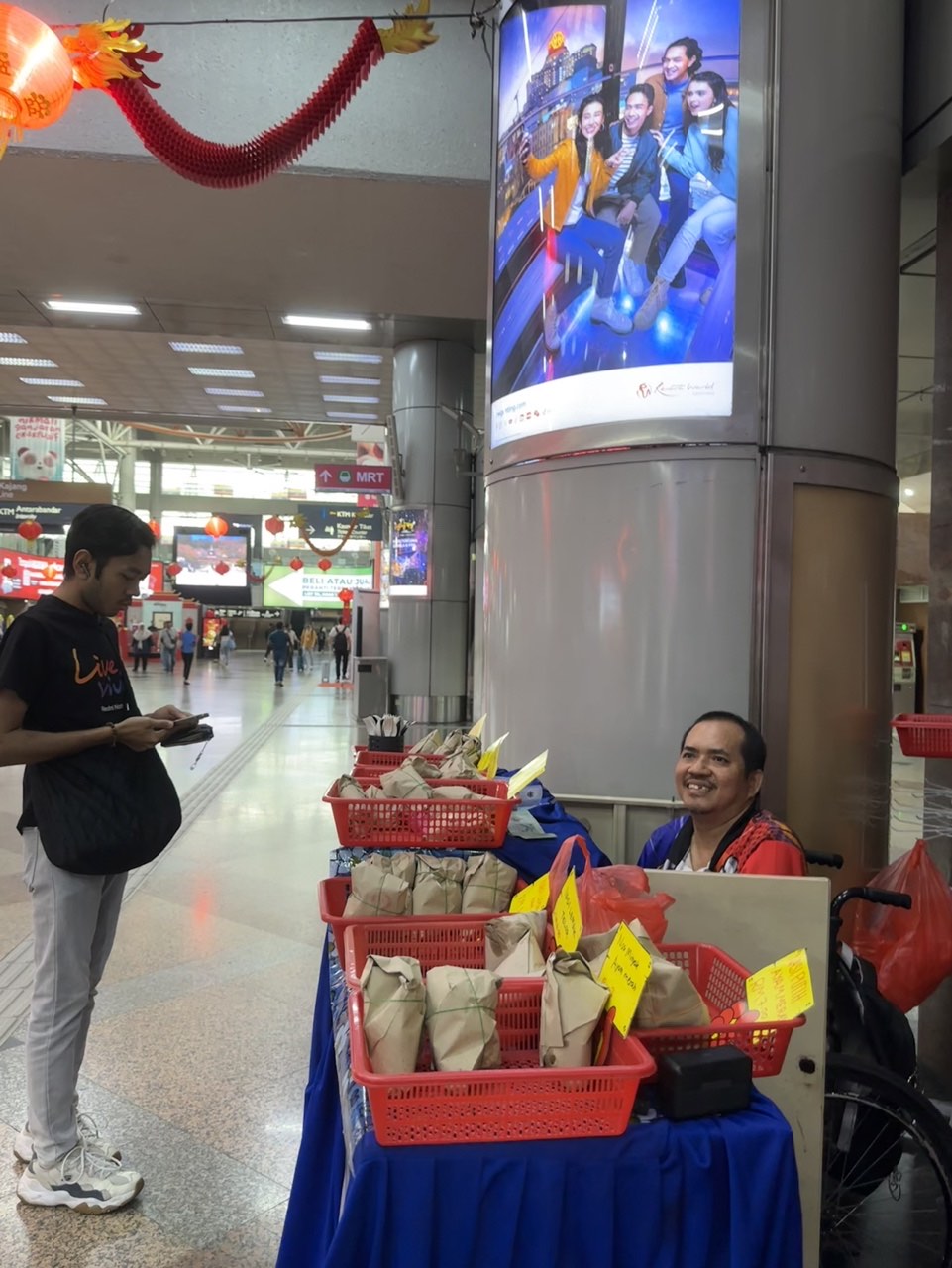 Customer buying mohd's nasi lemak