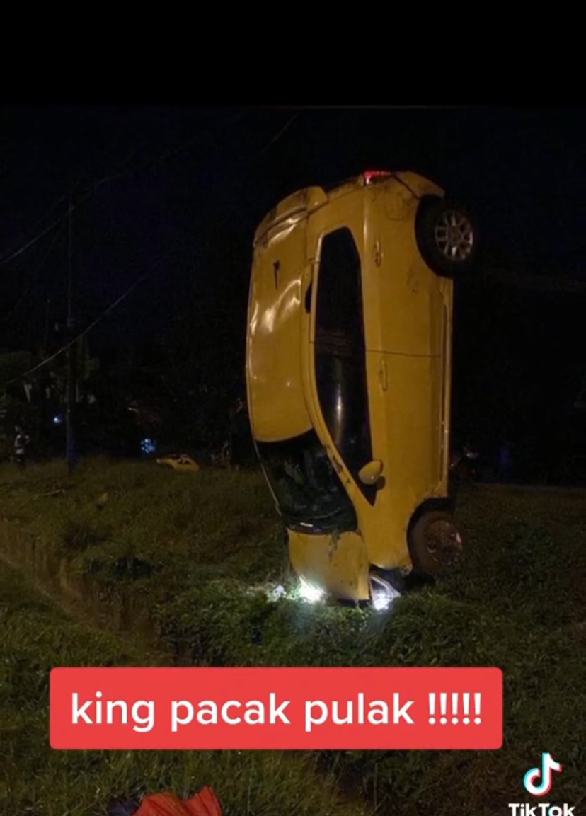 King myvi's in trouble again, this time in an upright position